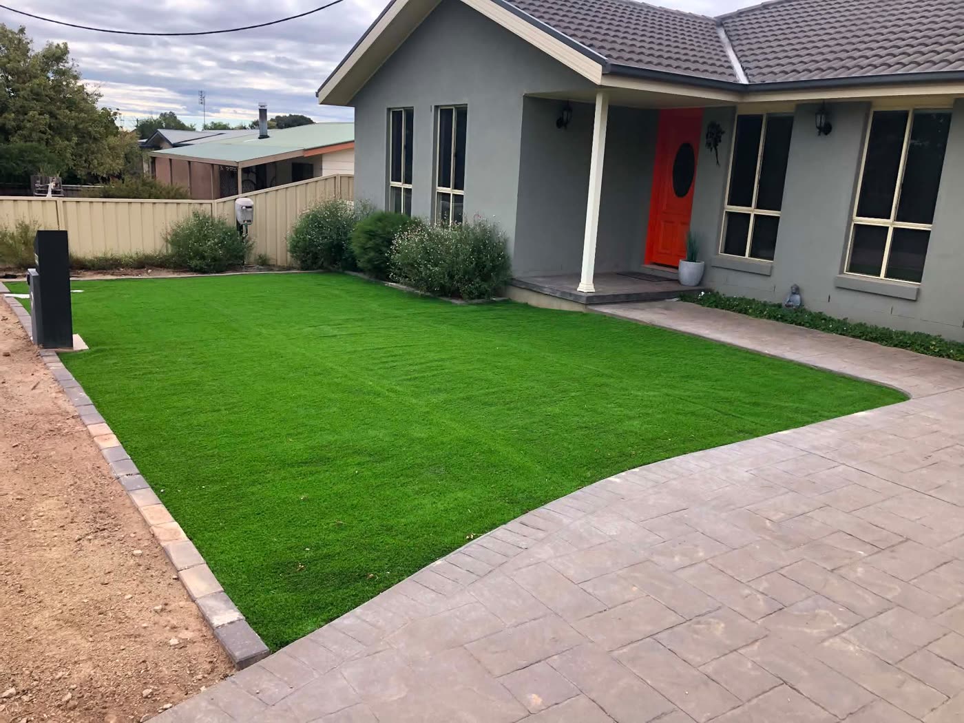 Fresh green lawn laid in the front yard