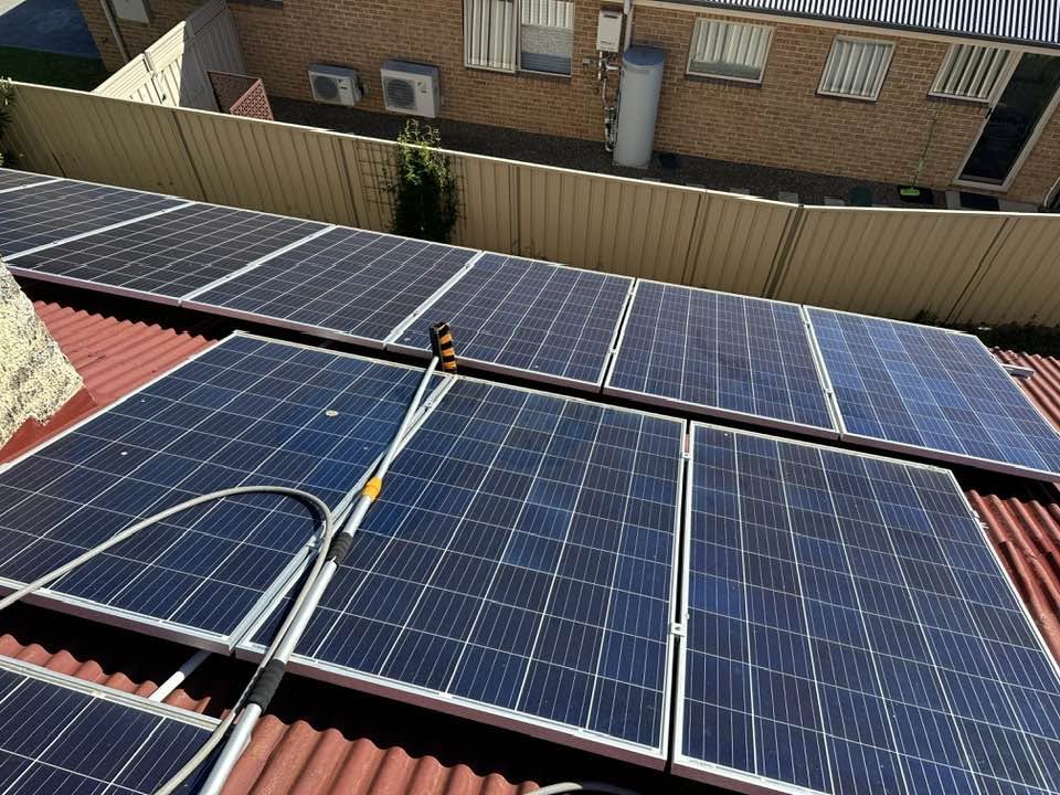 Rooftop solar array washed down by Jenko