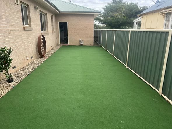 Neat, tidy yard with new turf and fencing